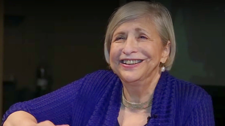 chef Nathalie Dupree smiling in blue sweater