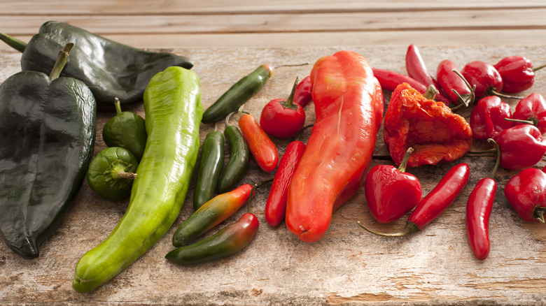 A variety of chiles on a table